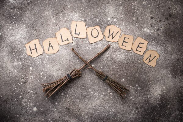 Halloween background with witches broom