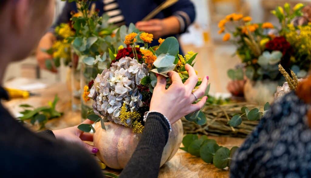 Natural flowers. Floral arrangement workshop with autumn flowers.